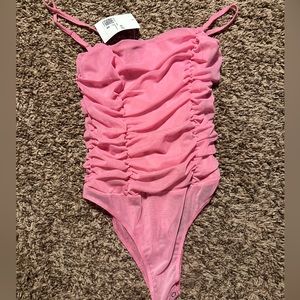 Pink mesh bodysuit